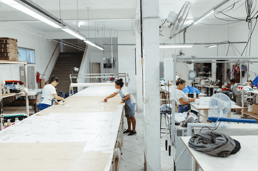 Everyone in the garment factory is doing their job.