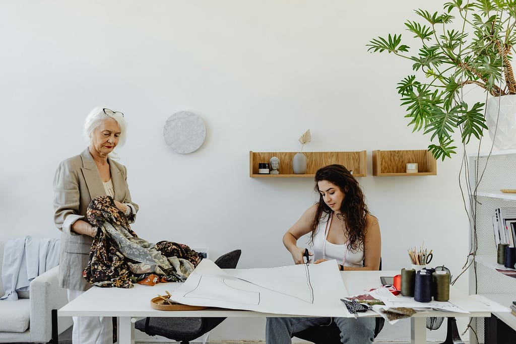 The two women are discussing the Product Line and Design Plan.