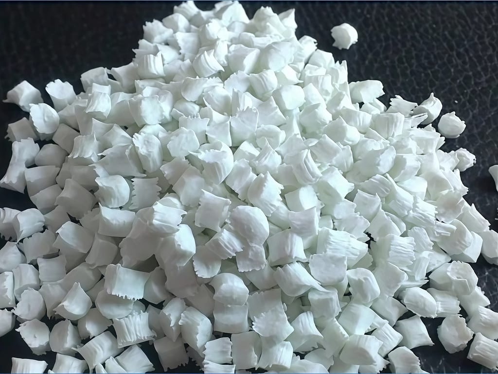 This is the raw material of PBT fabric--Polybutylene Terephthalate, is a milky white translucent to opaque, crystalline thermoplastic polyester resin.
