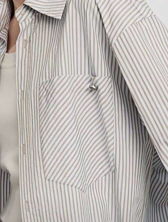 This is a detail view of a common type of pocket, the flat patch pocket, on a garment