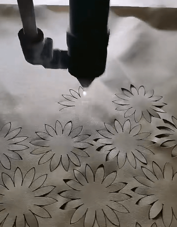 This is a picture of a laser cutting machine cutting cloth