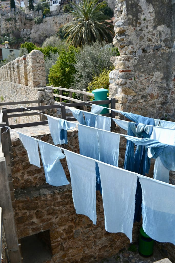 The washed clothes are being hung out to dry.