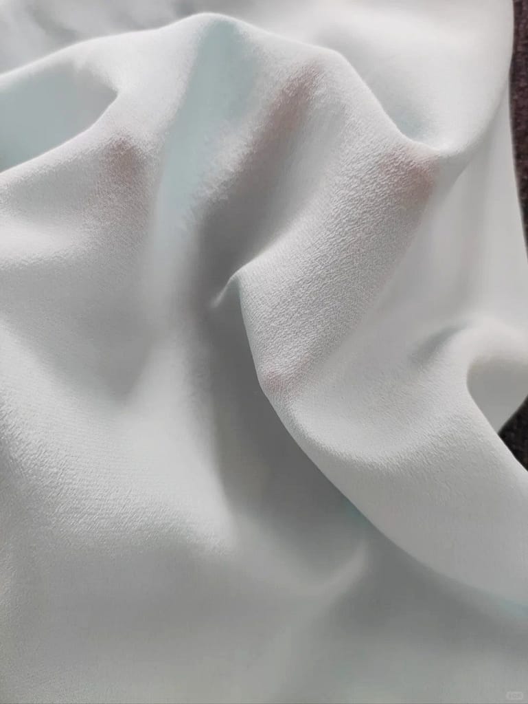 Fabric detail of Crepe, one of the fifteen lightest fabrics.