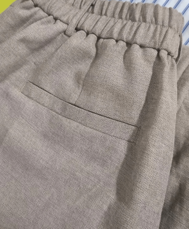 This is a detailed view of a common type of pocket, the Cut-In Pocket, on a garment.