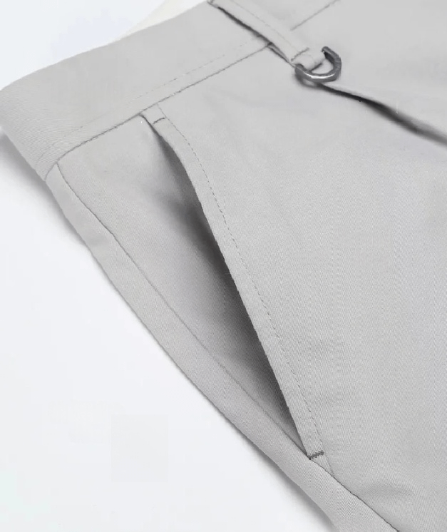 This is a detailed view of a common type of pocket, the slash pocket, on a garment.